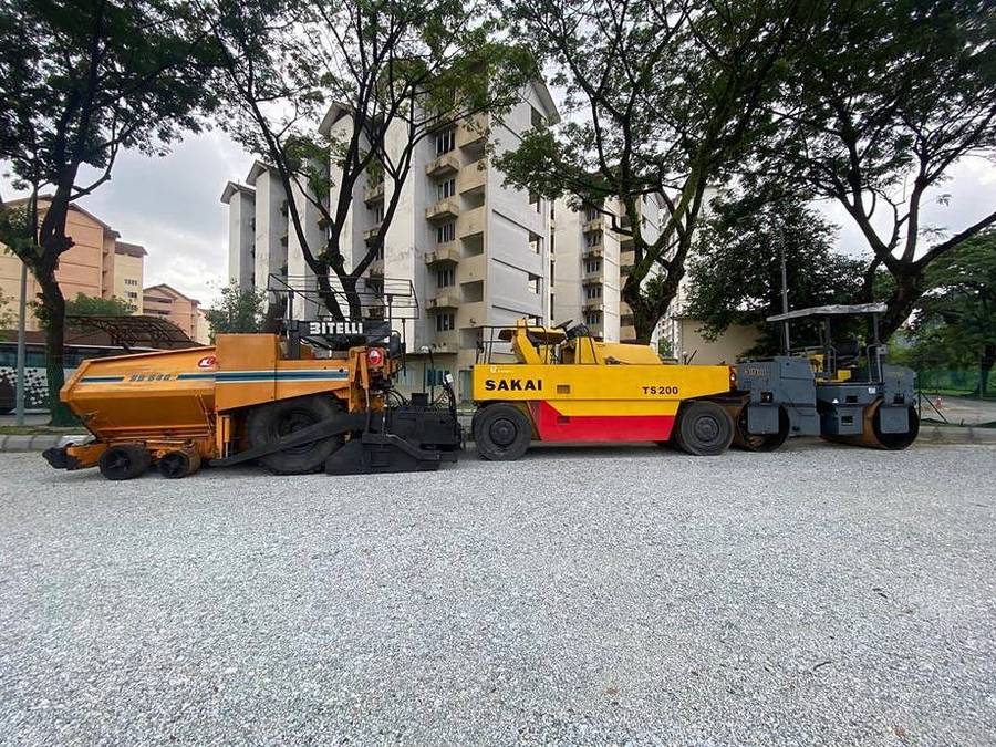 Zone X asphalt paving fleet on site